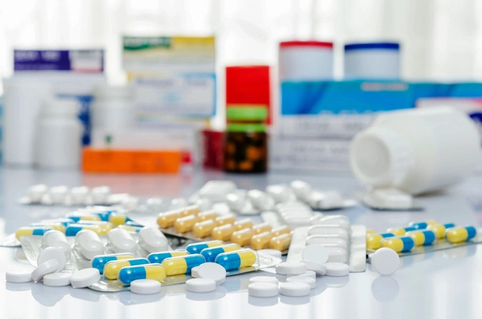 A table with many different types of pills.