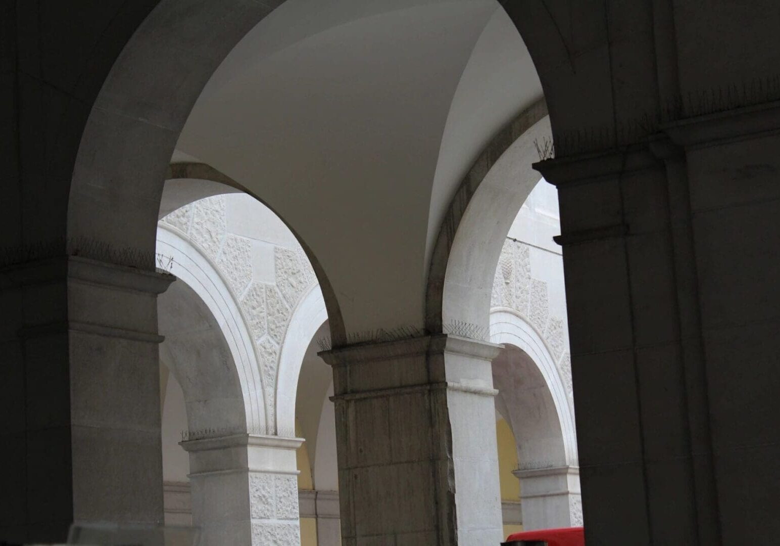 A view of an archway in the middle of a building.
