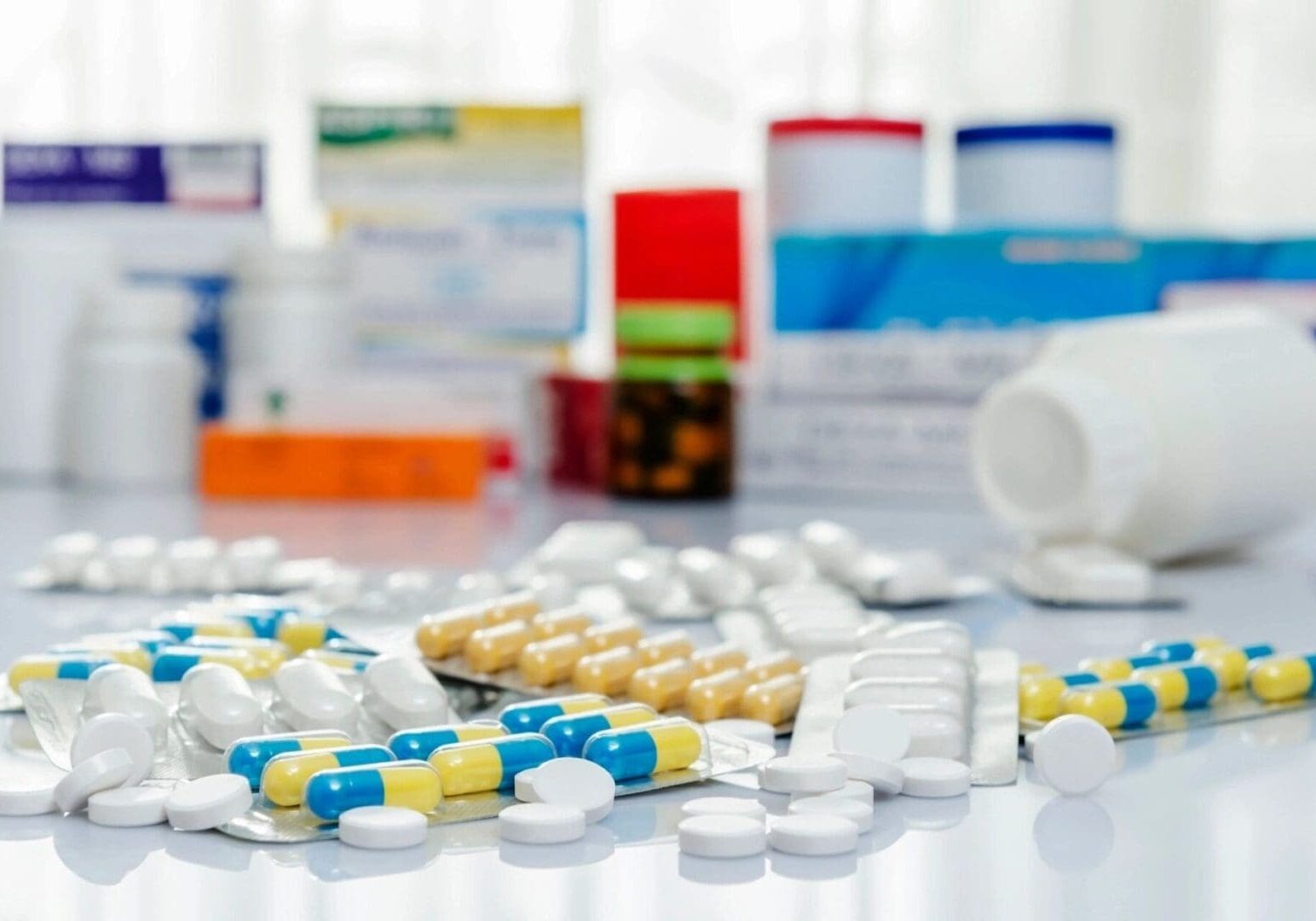 A table with many different types of pills.
