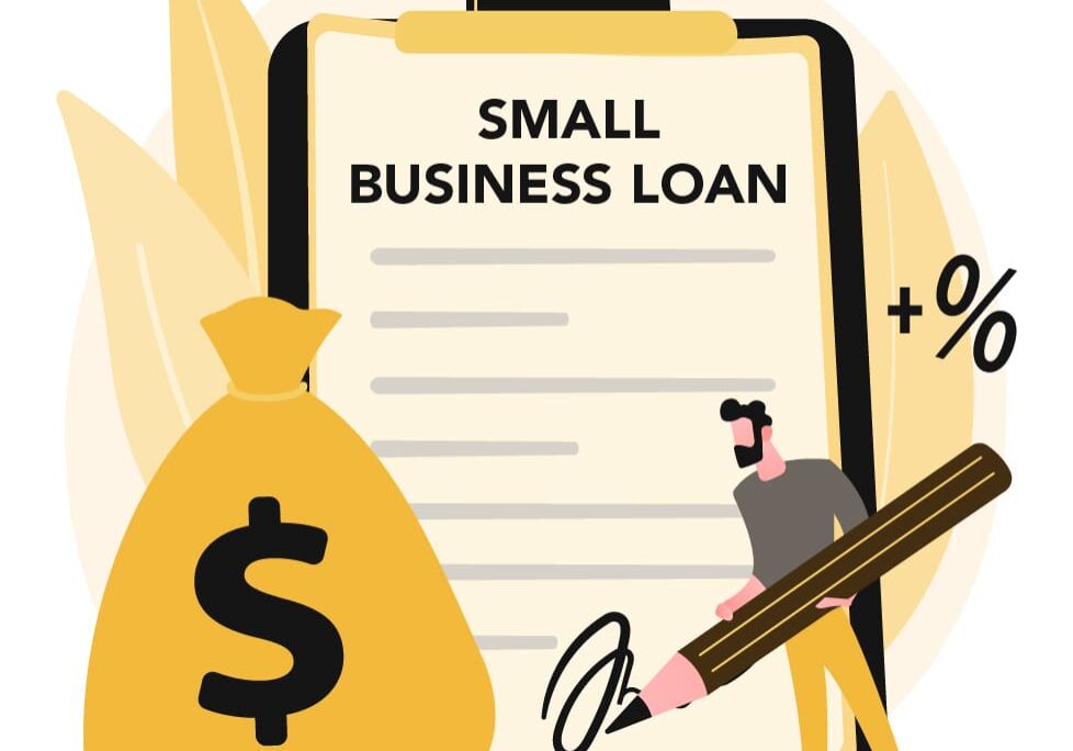 A person signing a small business loan agreement